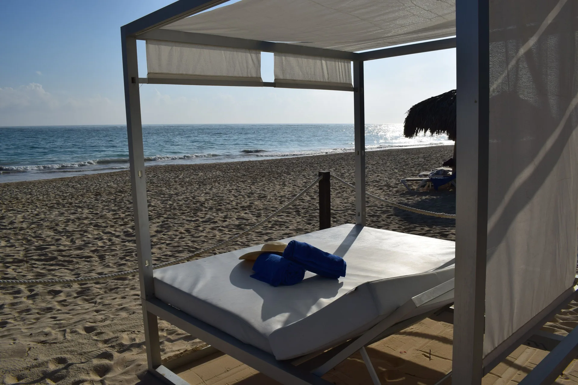 White beach cabana facing the ocean at Princess Family Club Bavaro.
