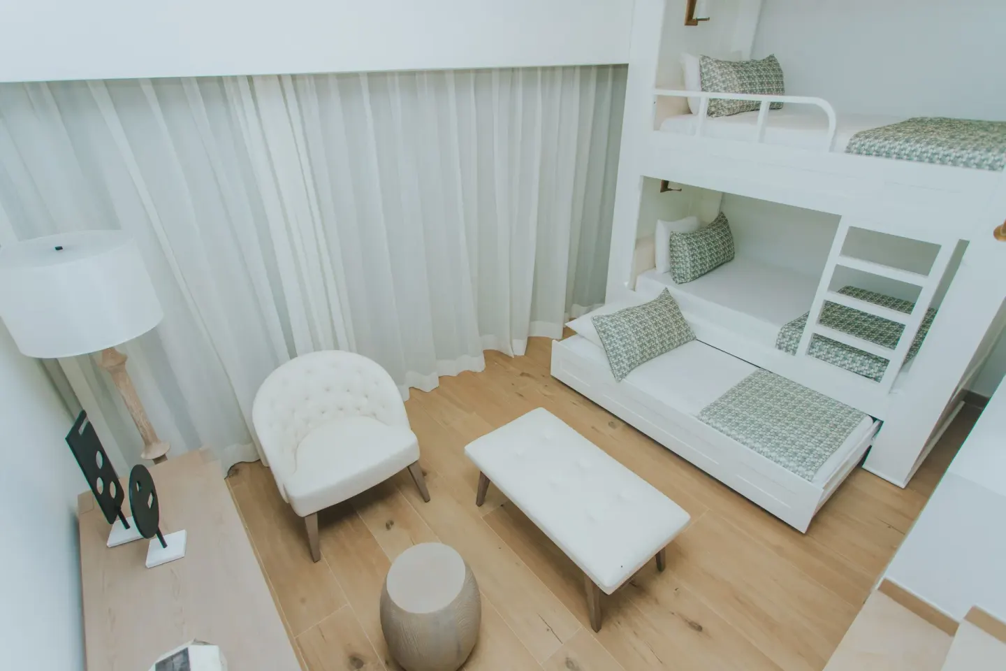 Family Club Junior Suite Swimout bunk beds and lounge area at Princess Family Club Bavaro.