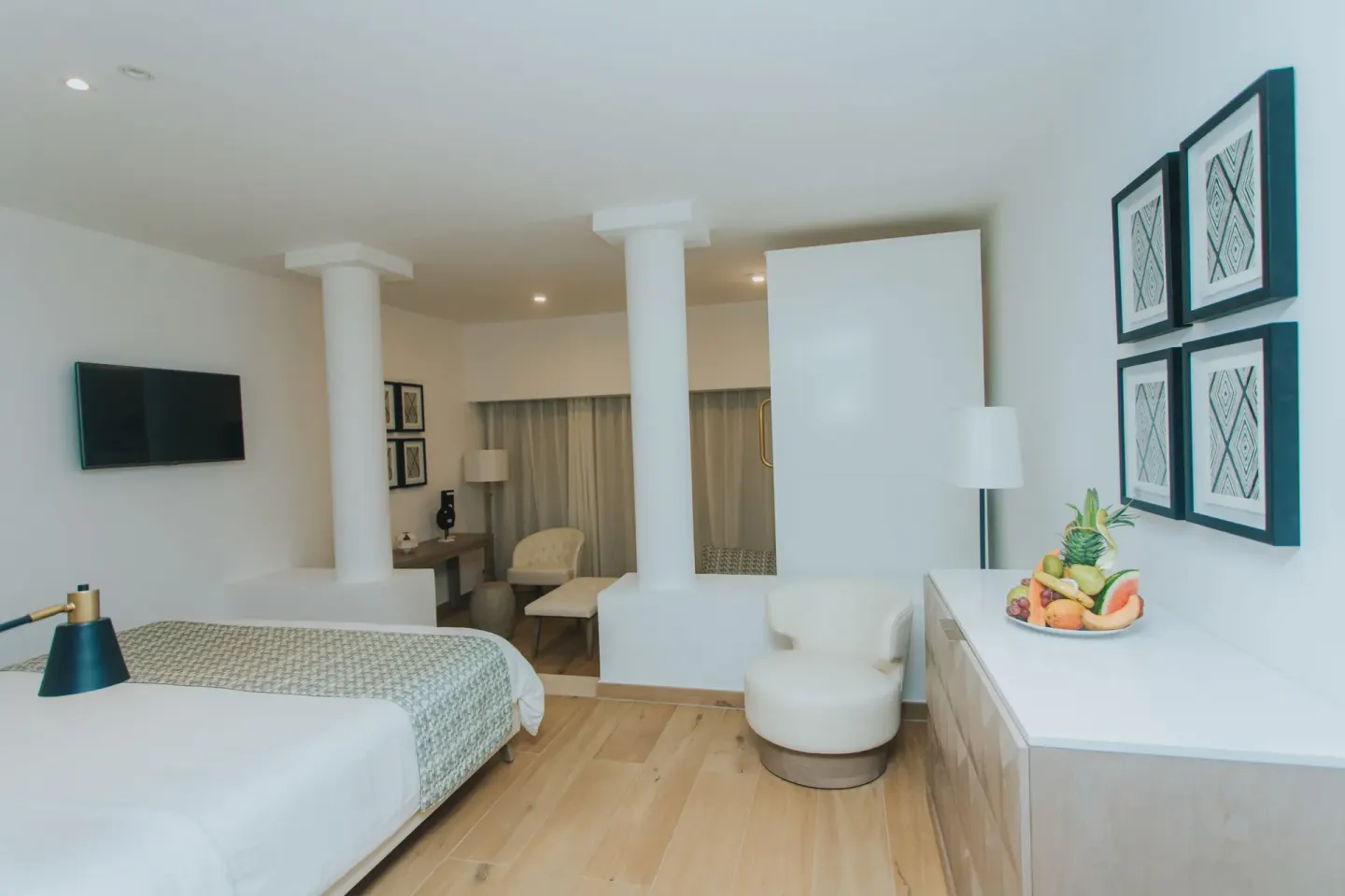 Family Club Junior Suite Swimout with bed and seating at Princess Family Club Bavaro.