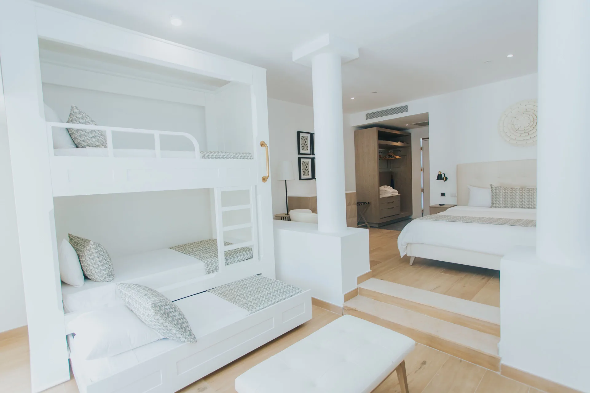 Family Club Junior Suite with bunk beds and king bed at Princess Family Club Bavaro.