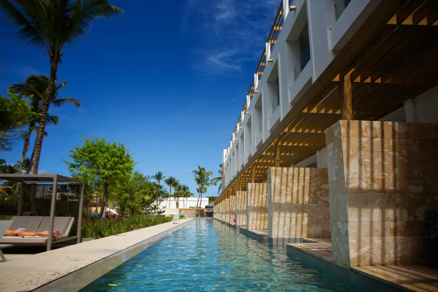 Family Club Junior Suite swim-up pool beside room terraces at Princess Family Club Bavaro.