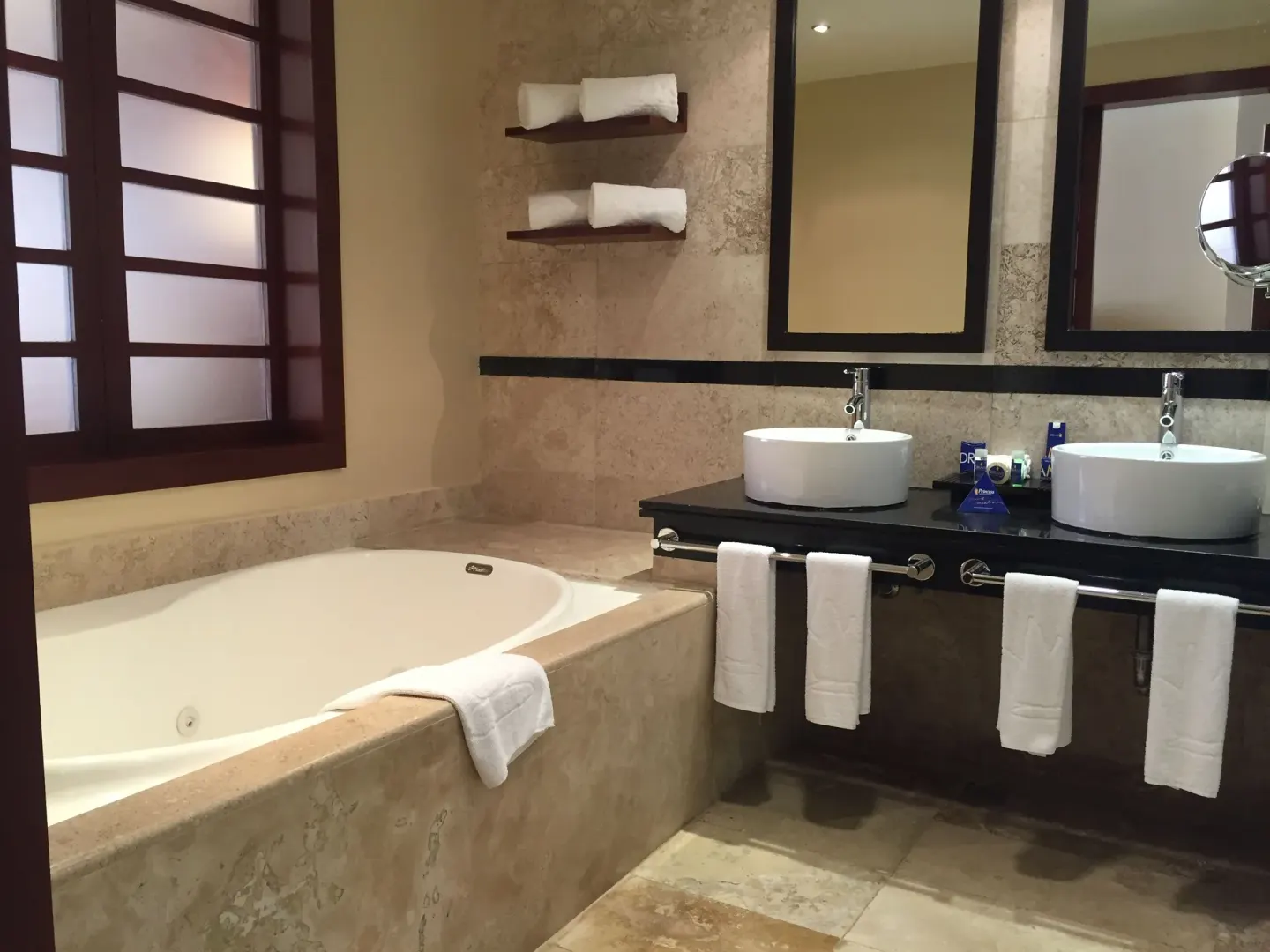Bathroom with soaking tub and double vessel sinks at Princess Family Club Riviera.