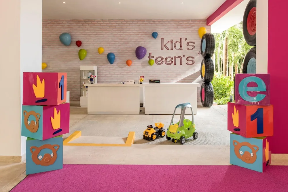 A kids and teens reception area with toy blocks at Princess Family Club Riviera.