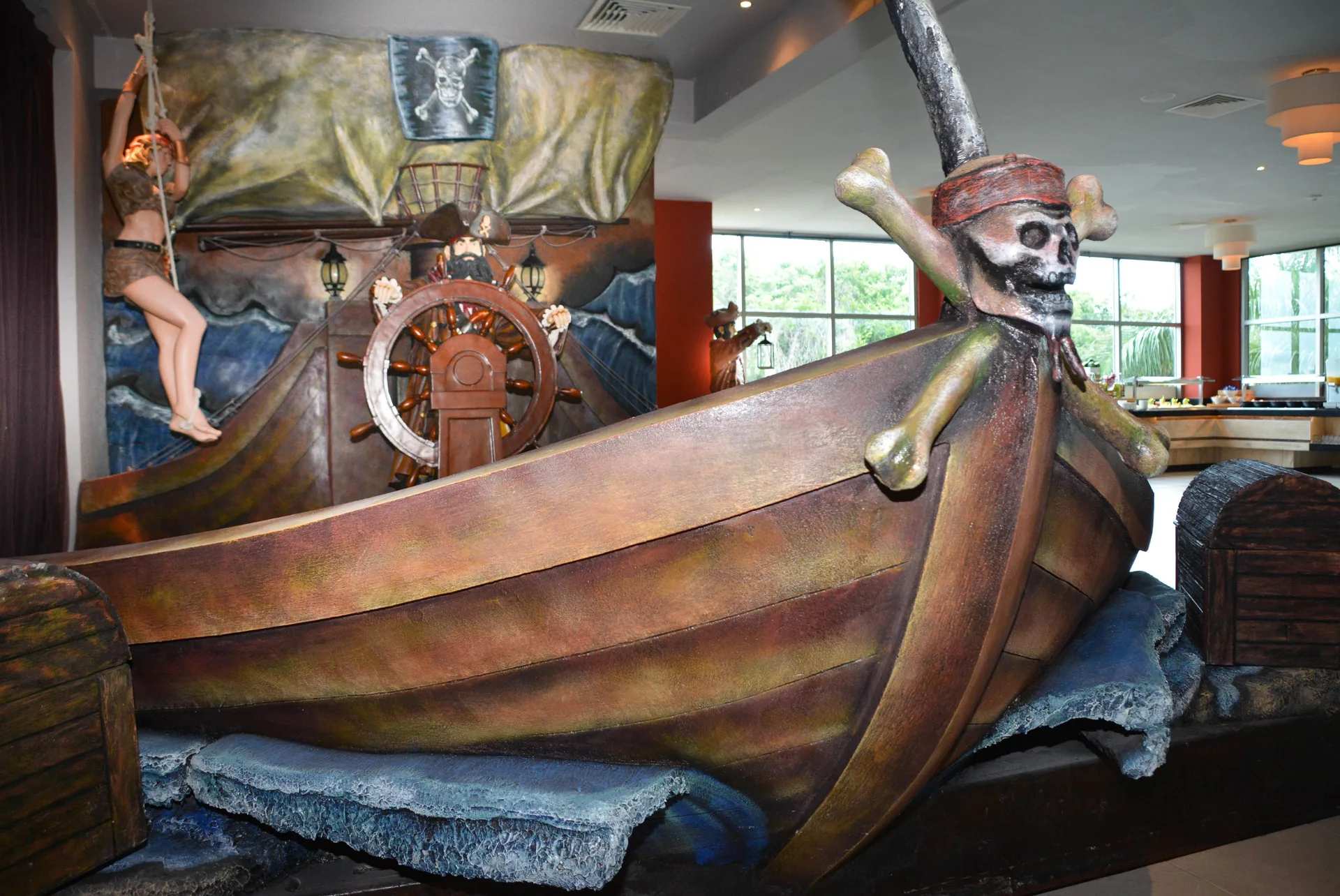 Pirate ship display with skull bow detail inside Princess Family Club Riviera.