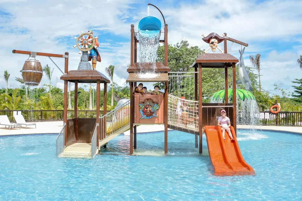 Children play on a pirate-themed water playground at Princess Family Club Riviera.