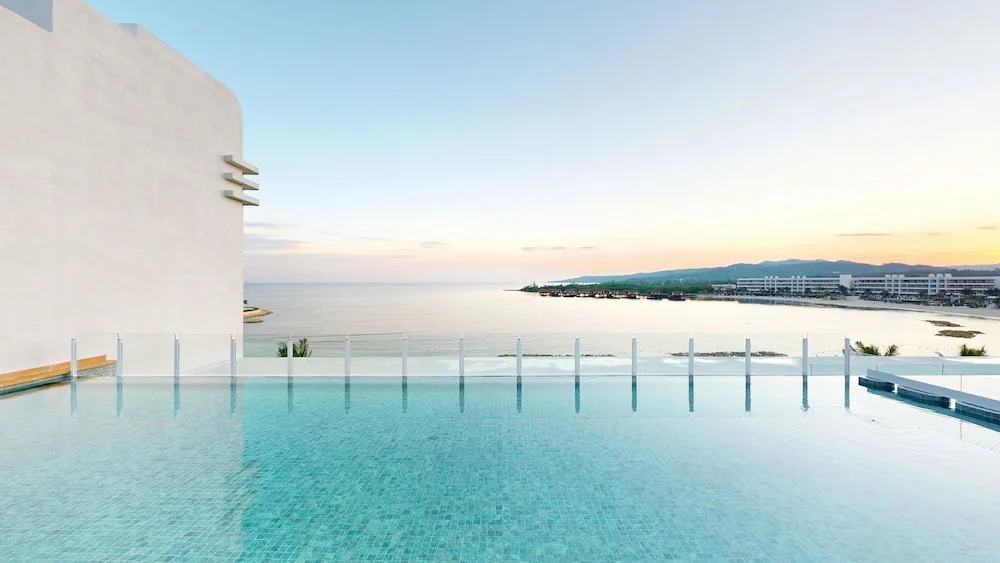 Infinity pool overlooking the bay at Princess Grand Jamaica Resort.