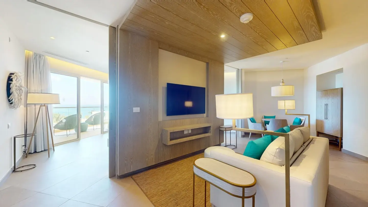Imperial 1 Bedroom Master Suite living room and bedroom entry at Princess Grand Jamaica Resort.