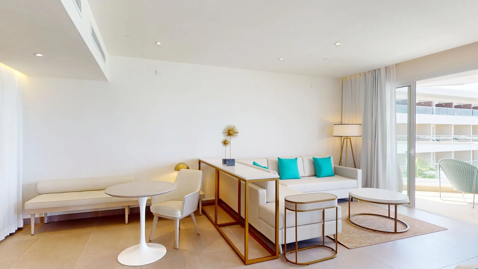 Platinum Club 2 Bedroom Master Suite at Princess Grand Jamaica Resort with spacious living area, modern furnishings, and private balcony overlooking Jamaica.
