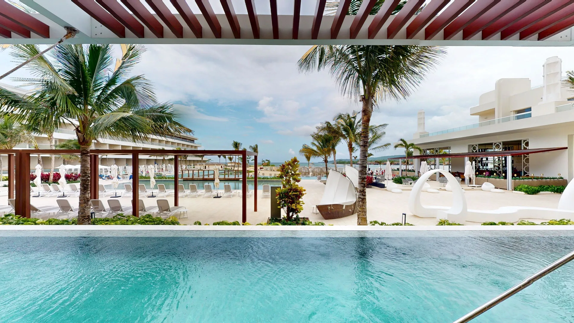 Swim Out Princess Junior Suite terrace pool view at Princess Grand Jamaica Resort.