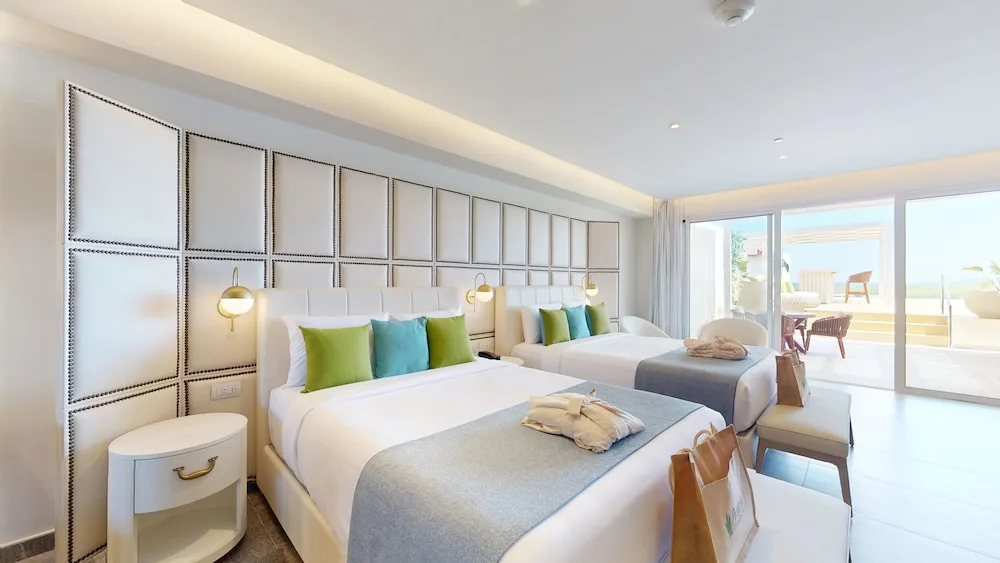 Two-bed guest room with terrace access at Princess Senses The Mangrove Resort.