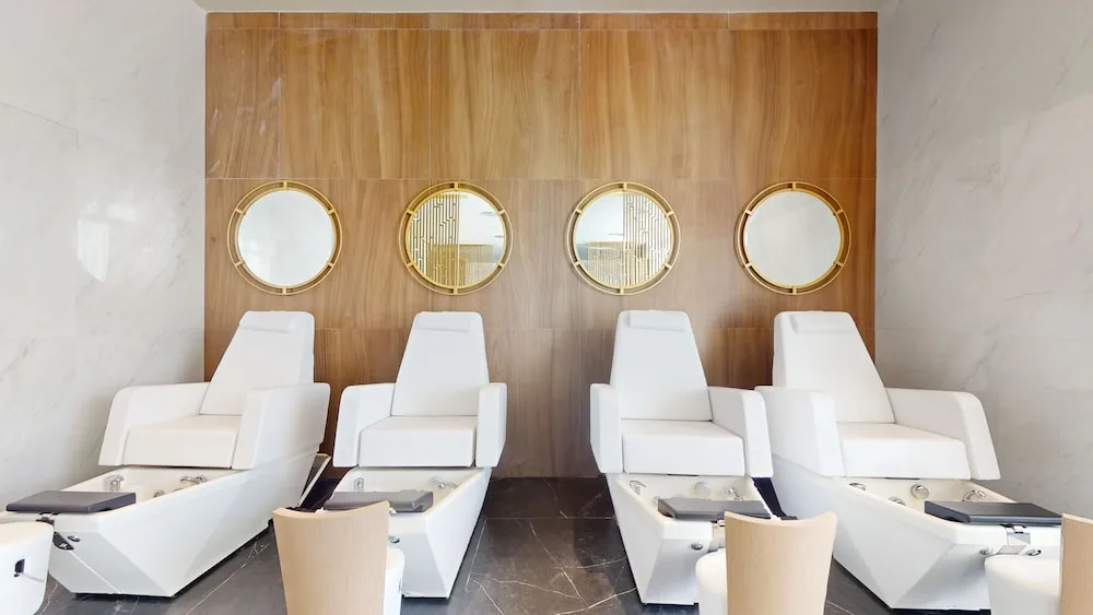 Spa pedicure chairs with round mirrors at Princess Senses The Mangrove Resort.