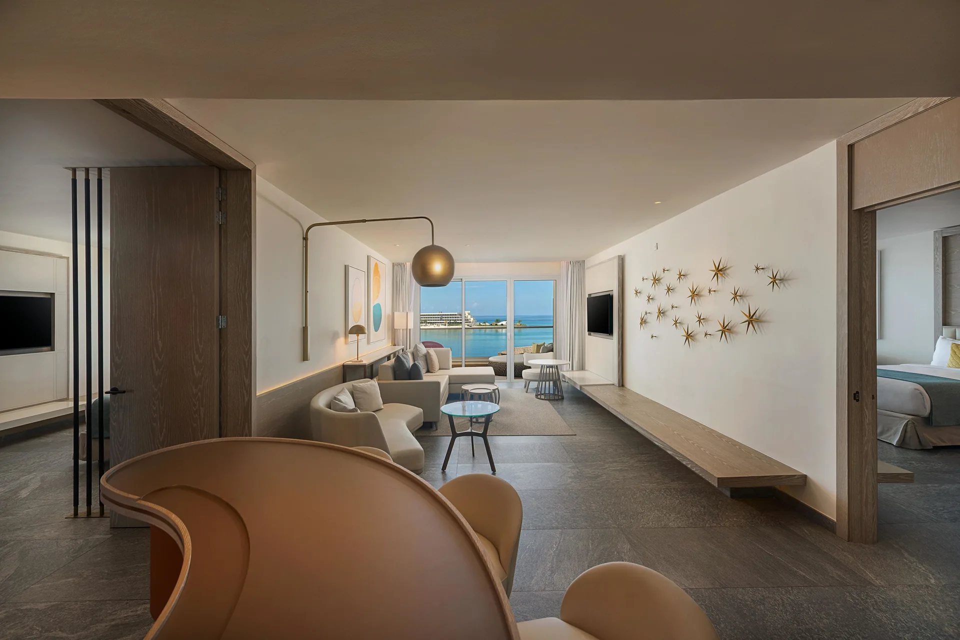 Suite living area with ocean view at Princess Senses The Mangrove Resort.