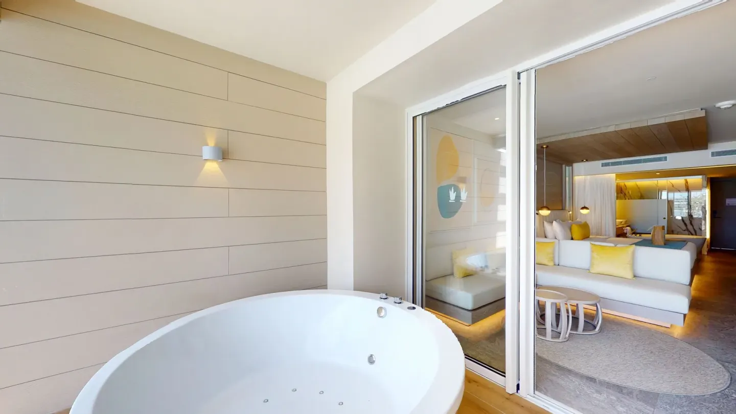 Outdoor soaking tub beside a suite terrace at Princess Senses The Mangrove Resort.