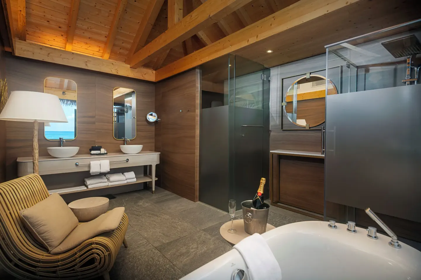 Bathroom vanity and tub in an Overwater Villa at Princess Senses The Mangrove Resort.