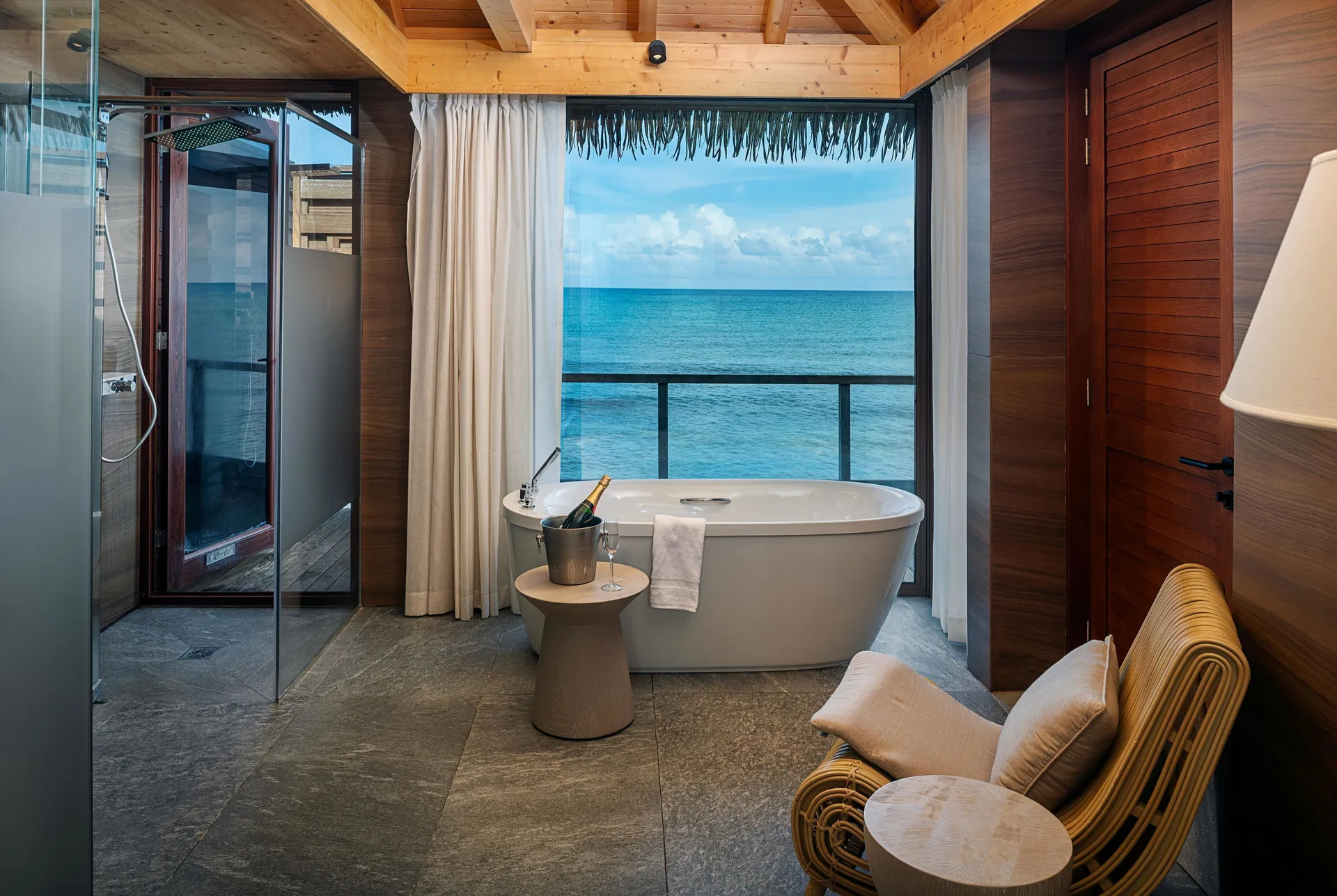 Ocean-view bathtub in an Overwater Villa at Princess Senses The Mangrove Resort.