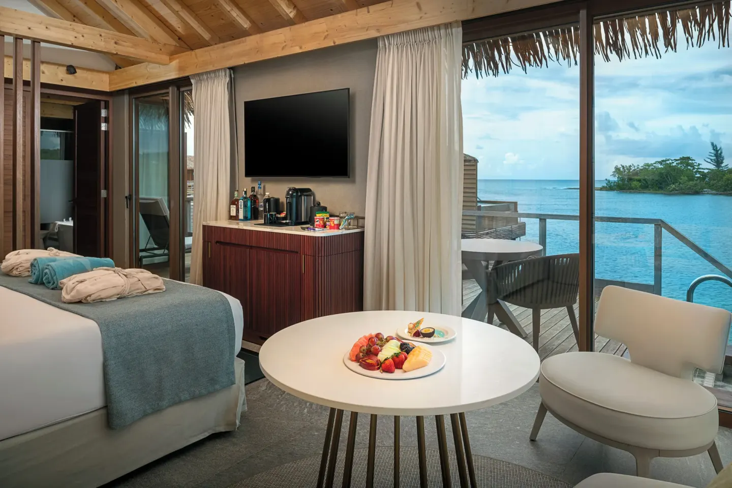 Overwater Villa bedroom with terrace view at Princess Senses The Mangrove Resort.