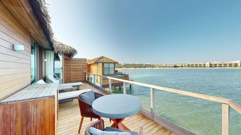 O'Club Swim Out Pleasure Junior Suite terrace at Princess Senses The Mangrove Resort with direct pool access and serene mangrove views.