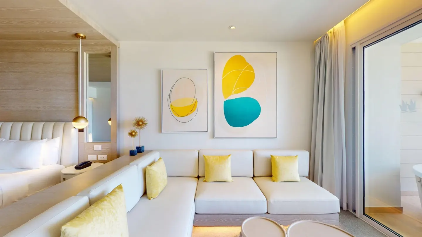 Platinum Junior Suite sofa and artwork at Princess Senses The Mangrove Resort.