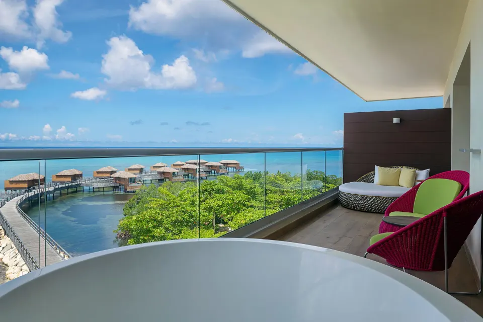 Platinum Master Suite balcony with outdoor seating and overwater villas at Princess Senses The Mangrove Resort.