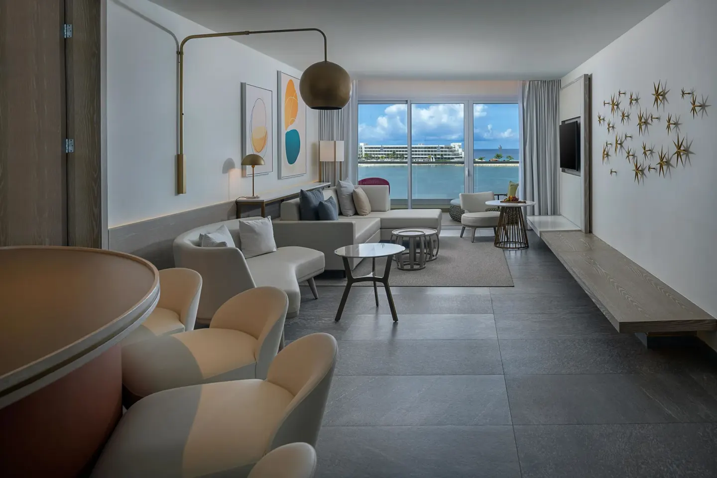 Platinum Master Suite living room with seating and ocean view at Princess Senses The Mangrove Resort.