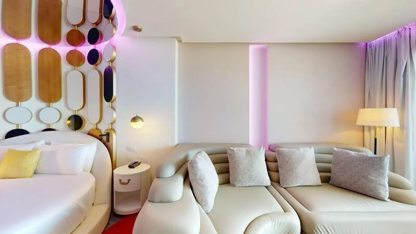 Pleasure Junior Suite bed and sofa seating at Princess Senses The Mangrove Resort.