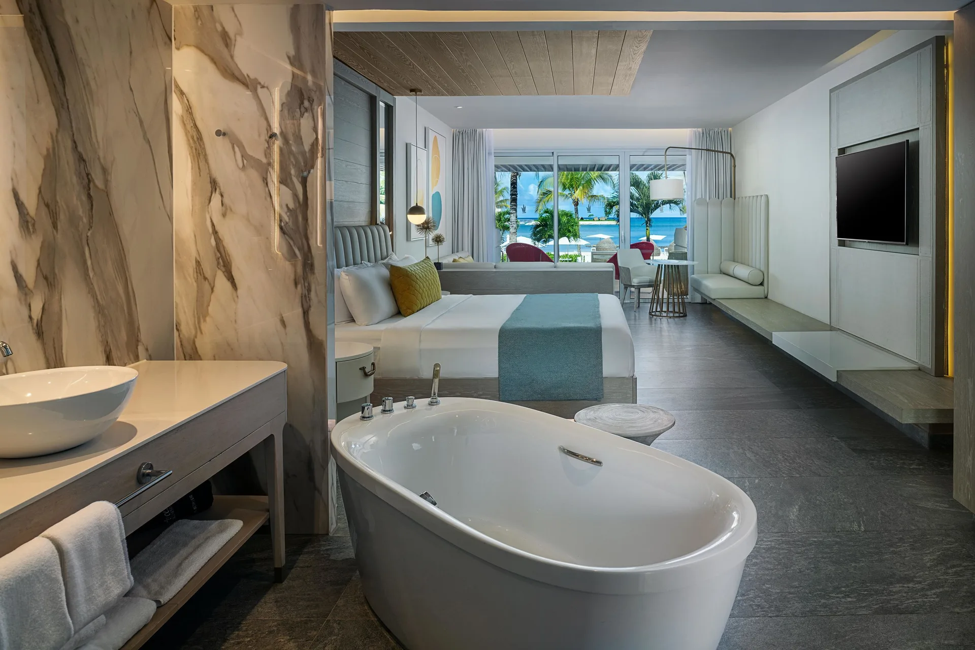 Swim Out Deluxe Junior Suite with tub and king bed at Princess Senses The Mangrove Resort.