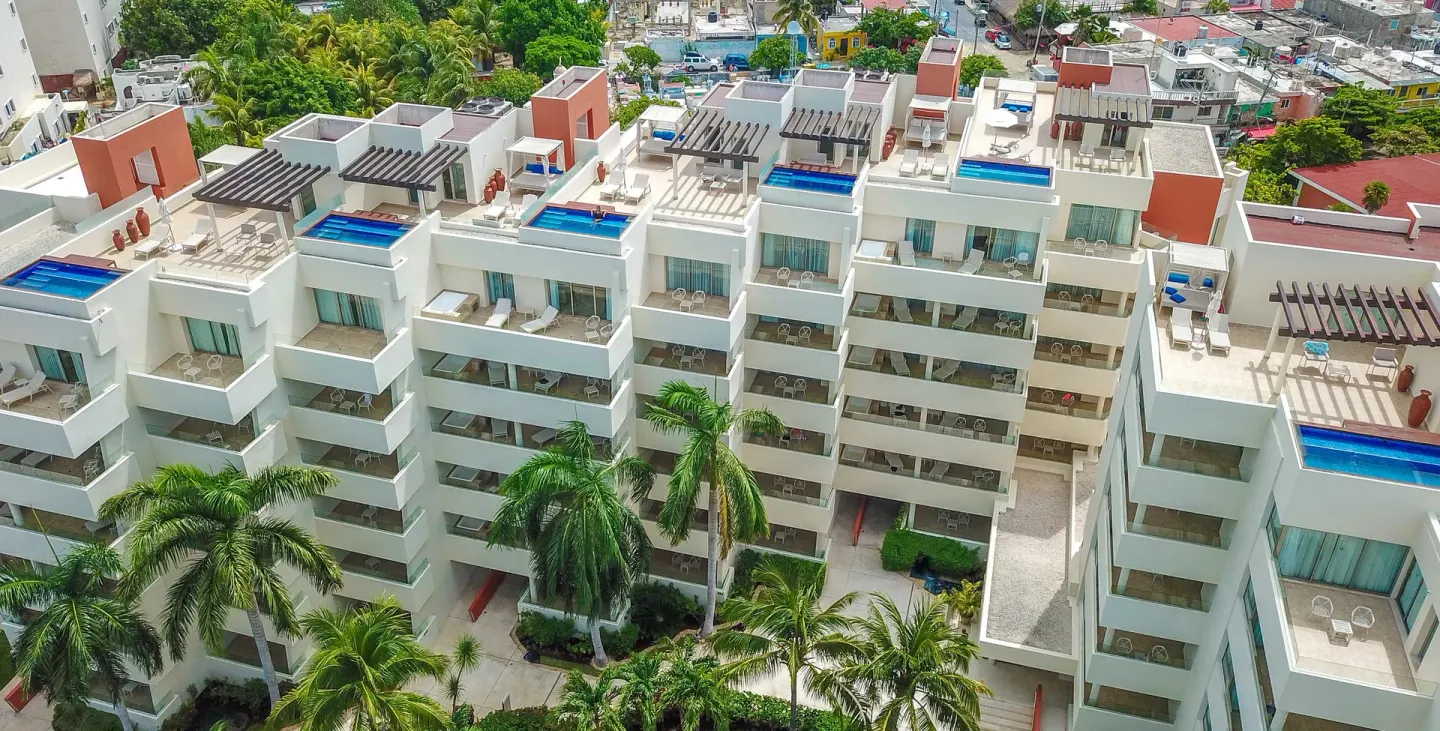 Guestroom balconies and rooftop plunge pools at Privilege Aluxes Isla Mujeres.