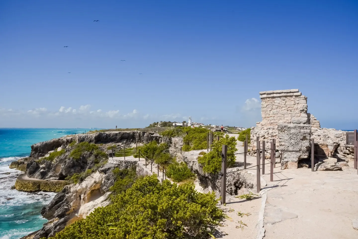 Stone ruins and cliffside path near Privilege Aluxes Isla Mujeres.