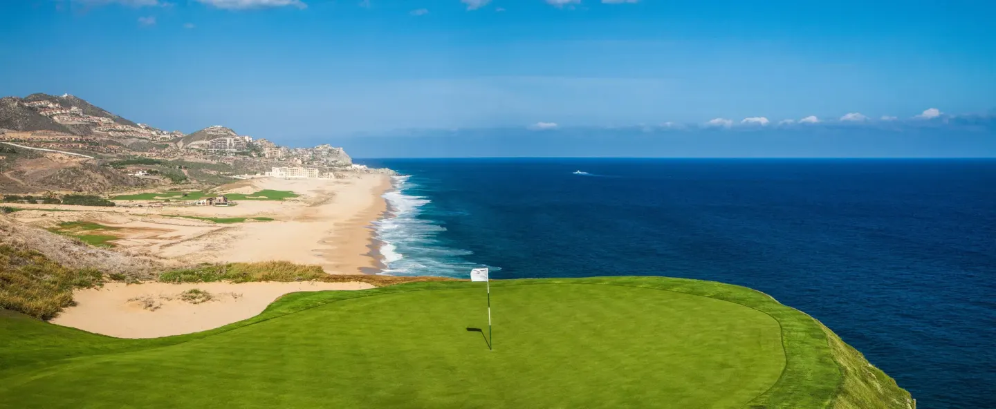 Golf green above the beach and ocean near Pueblo Bonito Los Cabos Blanco.