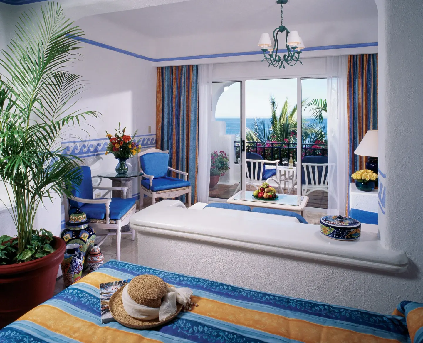 Junior Suite Ocean View seating area and balcony at Pueblo Bonito Los Cabos Blanco.