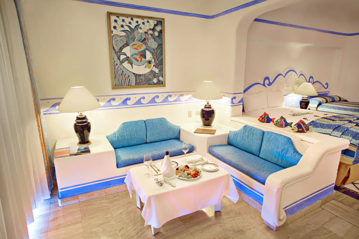 Junior Suite Ocean View sitting area and bed at Pueblo Bonito Los Cabos Blanco.