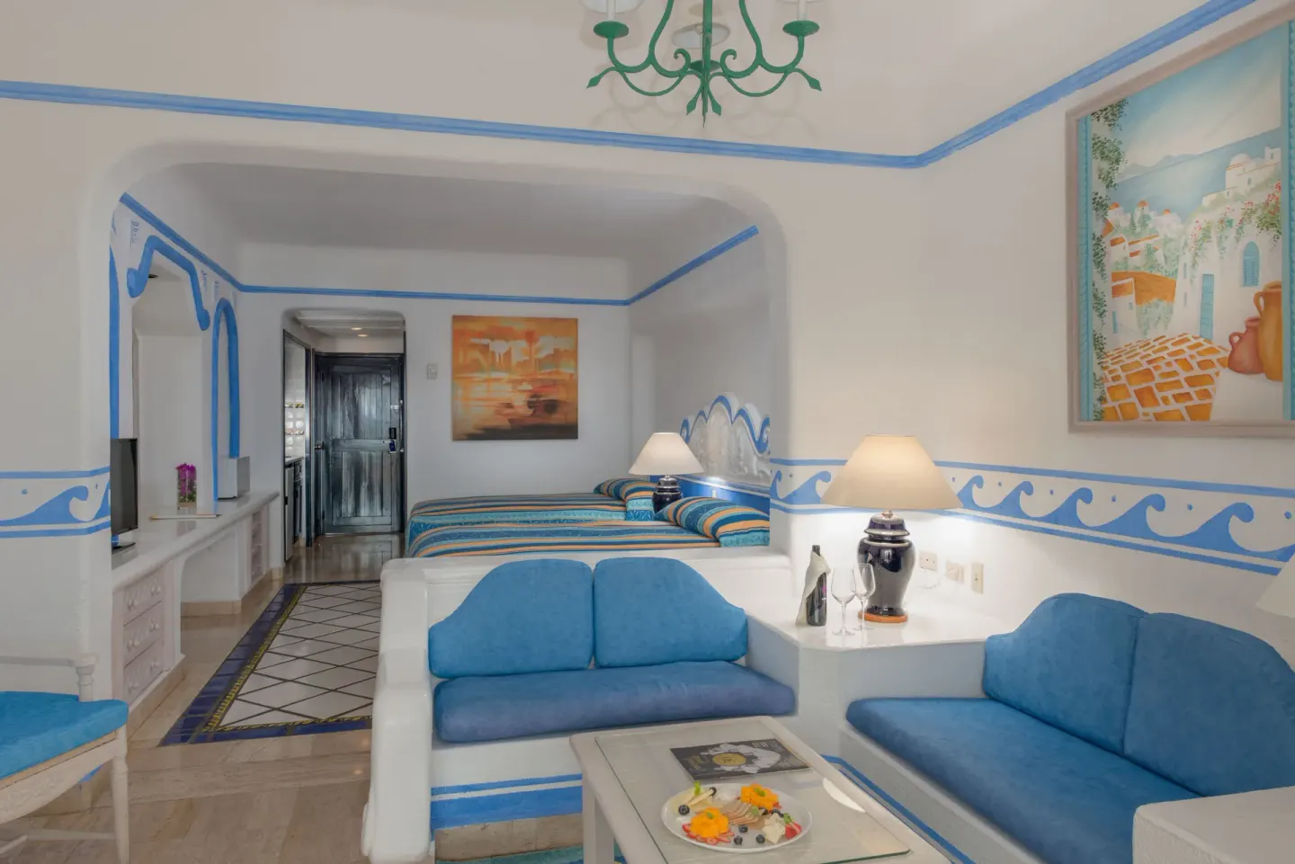 Junior Suite Ocean View lounge with two beds beyond at Pueblo Bonito Los Cabos Blanco.