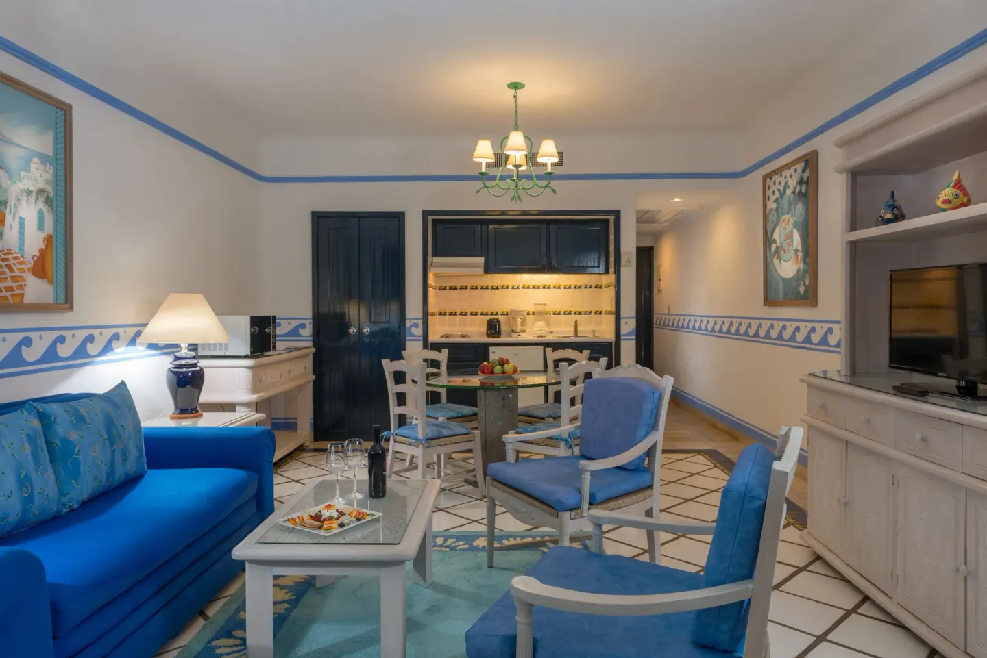 Luxury Suite lounge with kitchenette and dining table at Pueblo Bonito Los Cabos Blanco.