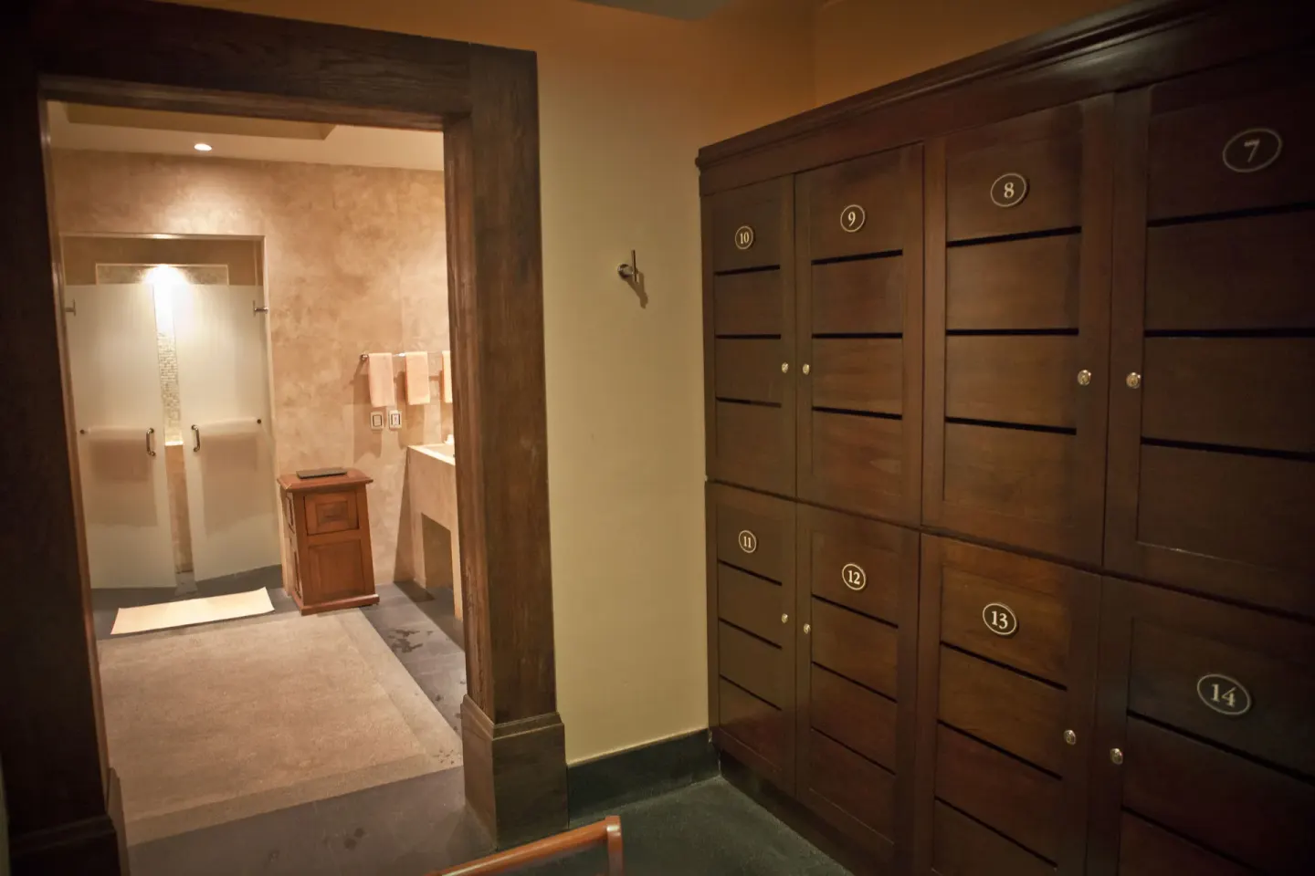 Wood lockers and a shower area at Pueblo Bonito Montecristo Luxury Villas.