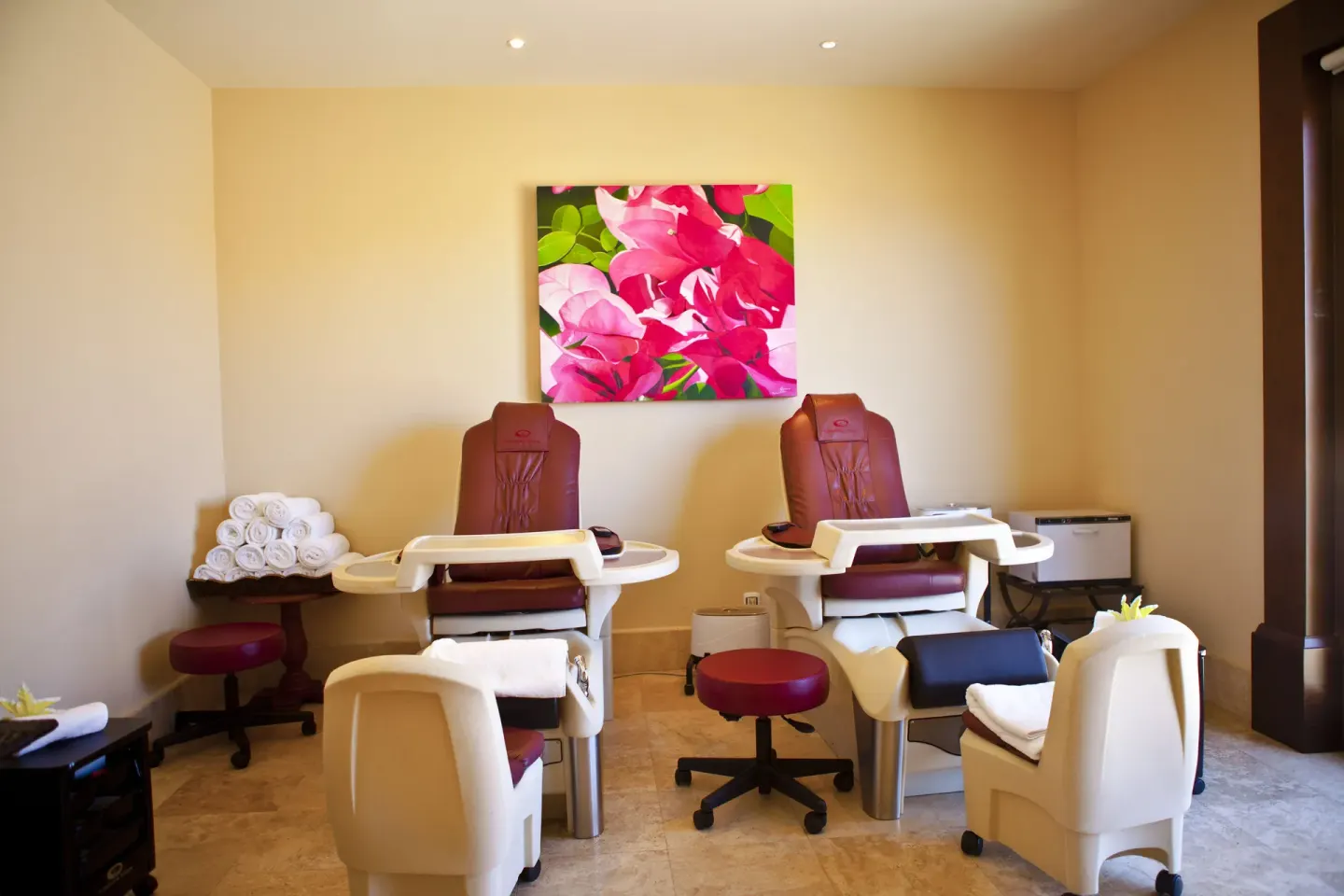 Pedicure chairs and rolled towels at Pueblo Bonito Montecristo Luxury Villas.