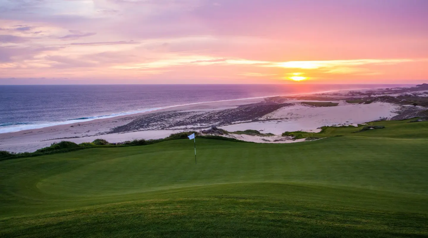 Golf green, beach, and sunset ocean view at Pueblo Bonito Montecristo Luxury Villas.