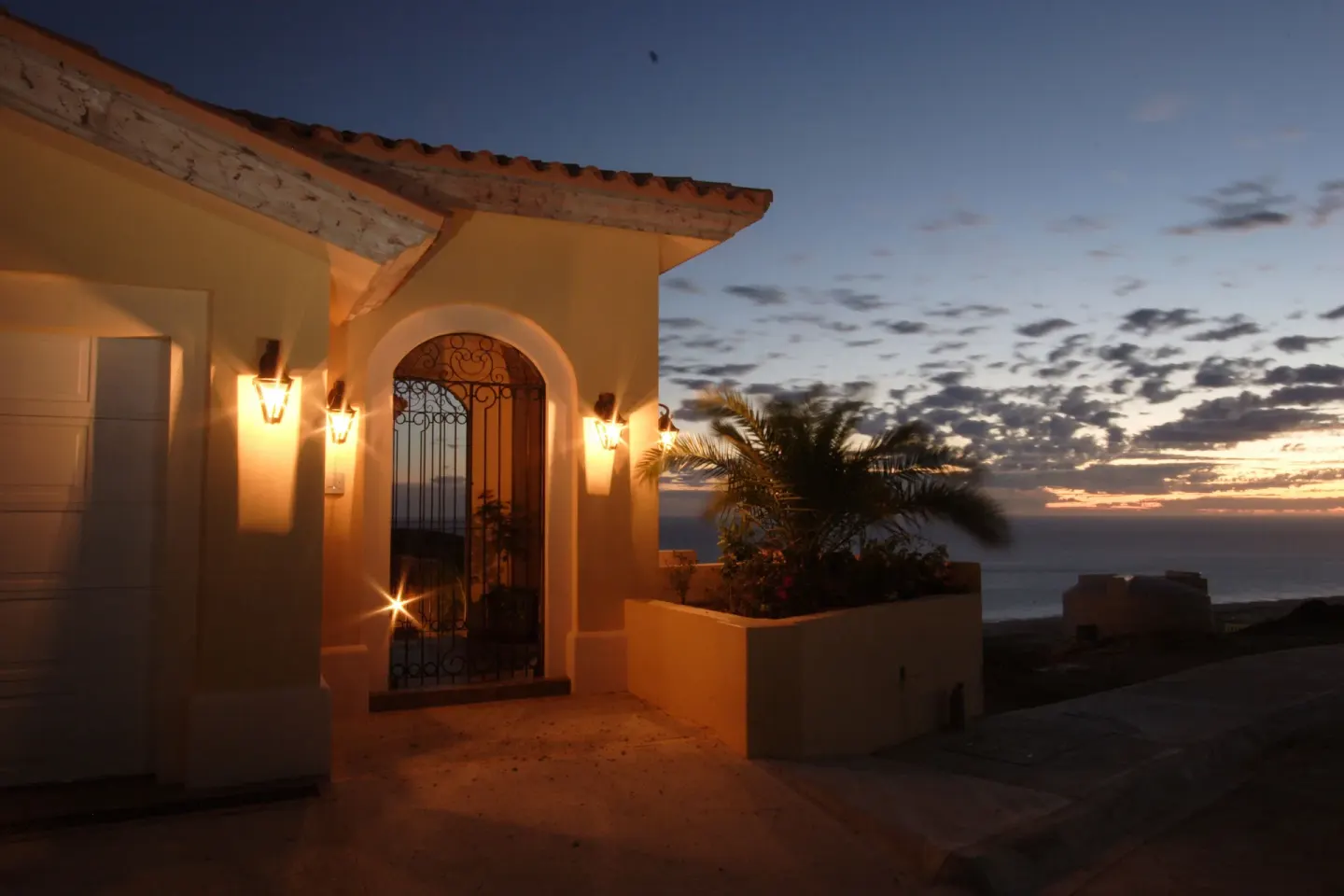 Villa entry glowing at sunset at Pueblo Bonito Montecristo Luxury Villas.