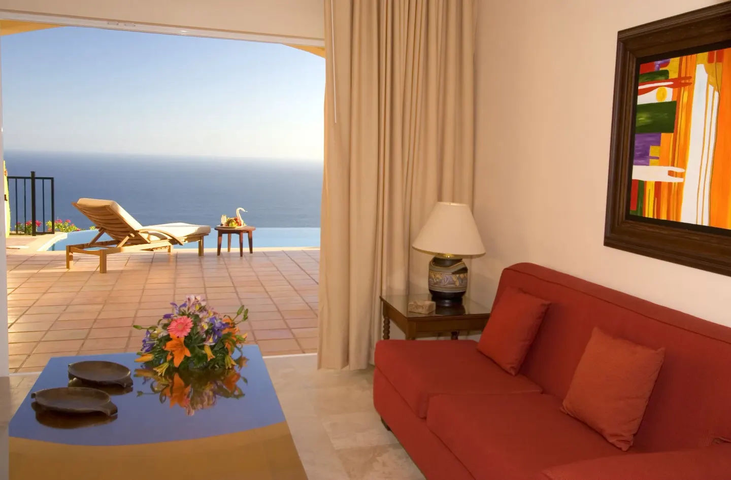 Villa sitting room and terrace with ocean view at Pueblo Bonito Montecristo Luxury Villas.