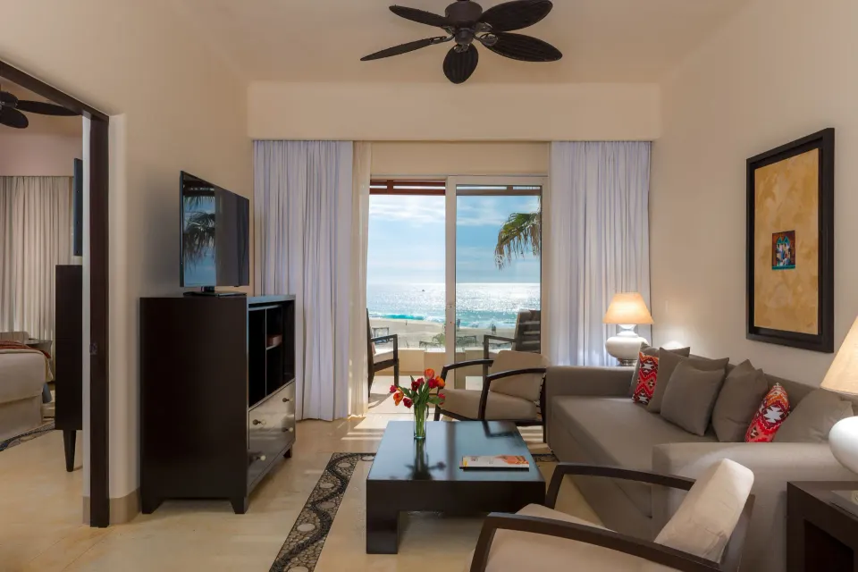 Oceanview Suite living room and balcony facing the ocean at Pueblo Bonito Pacifica Golf & Spa Resort.