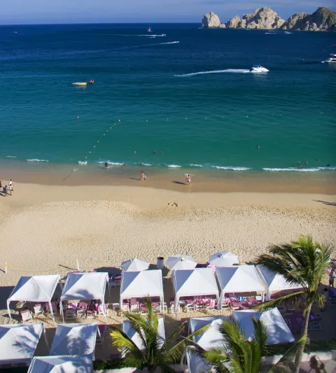 Beach cabanas and turquoise water at Pueblo Bonito Rose Resort and Spa.