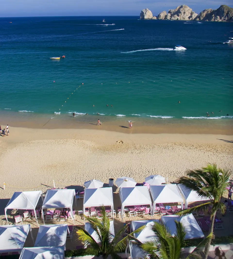 Beach cabanas and turquoise water at Pueblo Bonito Rose Resort and Spa.