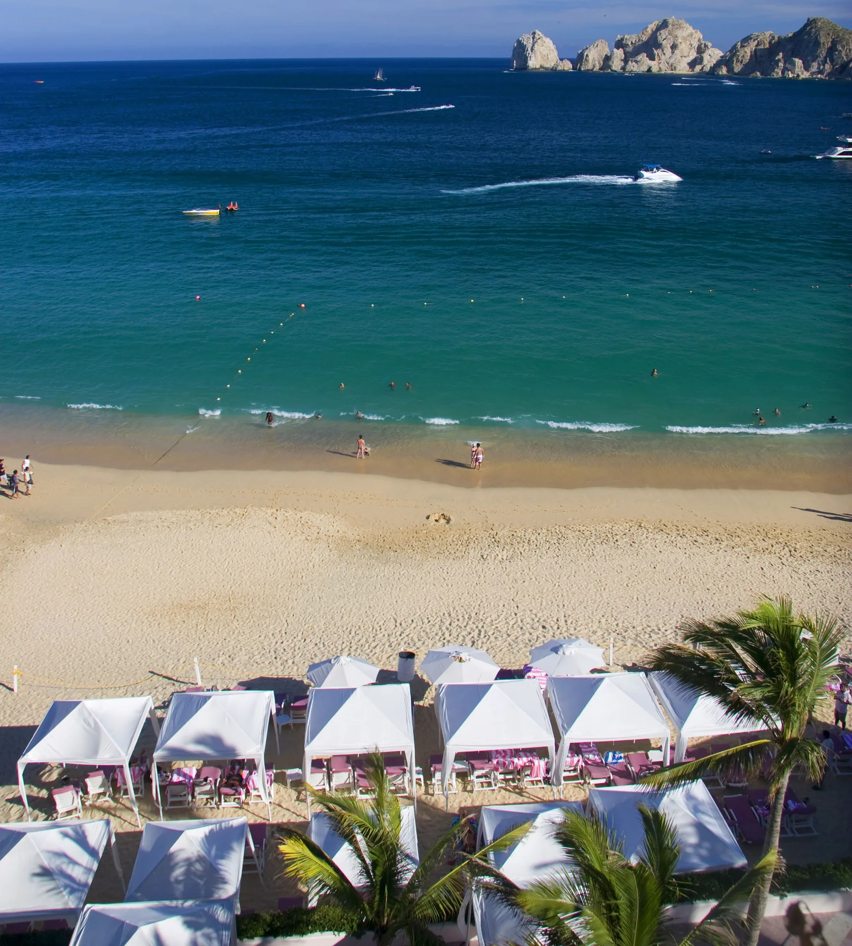 Beach cabanas and turquoise water at Pueblo Bonito Rose Resort and Spa.