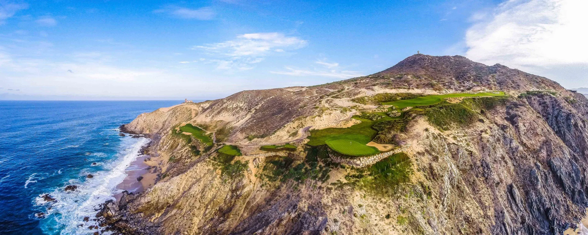 Coastal golf course on cliffs near Pueblo Bonito Rose Resort and Spa.