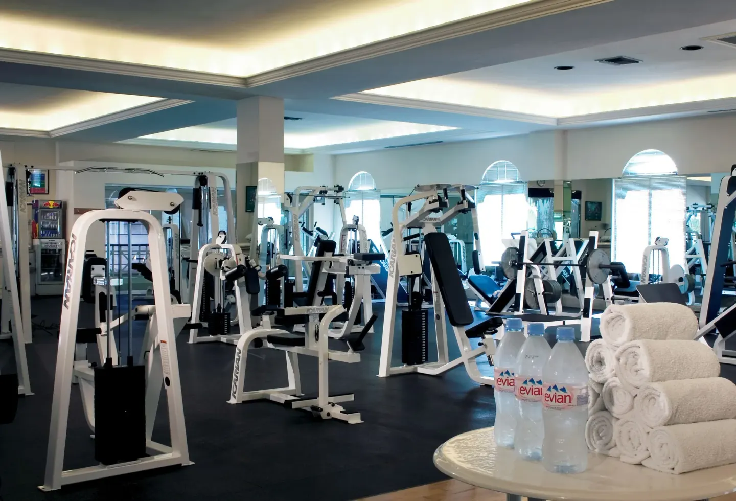 Fitness center with weight machines and towels at Pueblo Bonito Rose Resort and Spa.