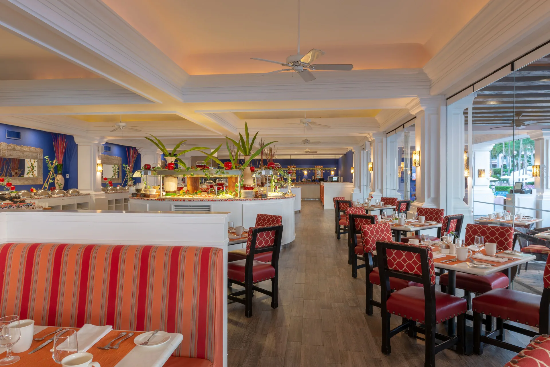 Buffet dining room with red chairs at Pueblo Bonito Rose Resort and Spa.