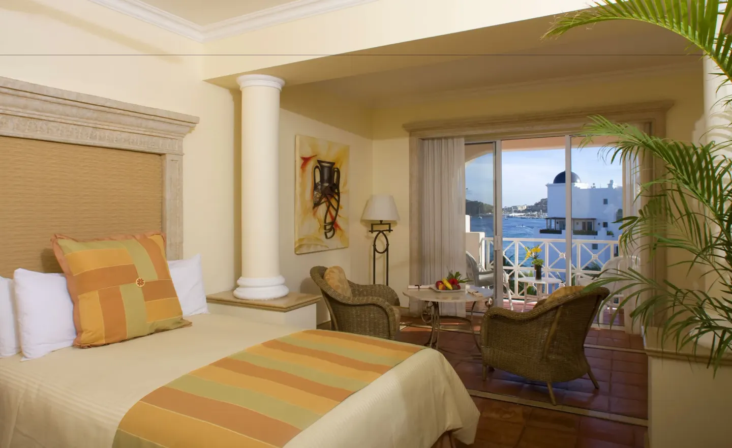 Junior Suite with king bed and balcony view at Pueblo Bonito Rose Resort and Spa.