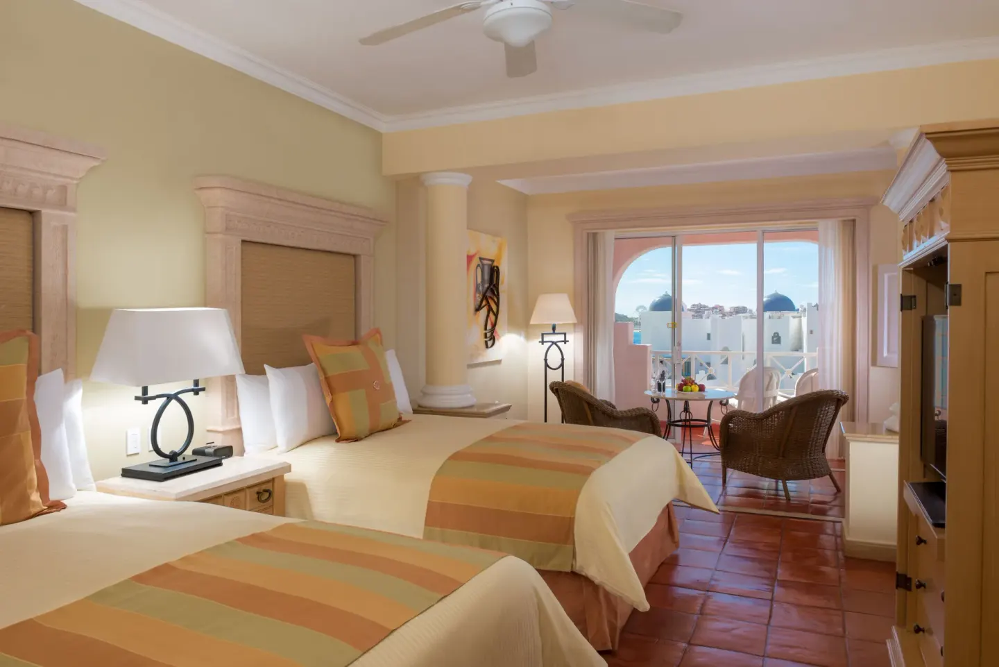 Junior Suite with two beds and balcony seating at Pueblo Bonito Rose Resort and Spa.