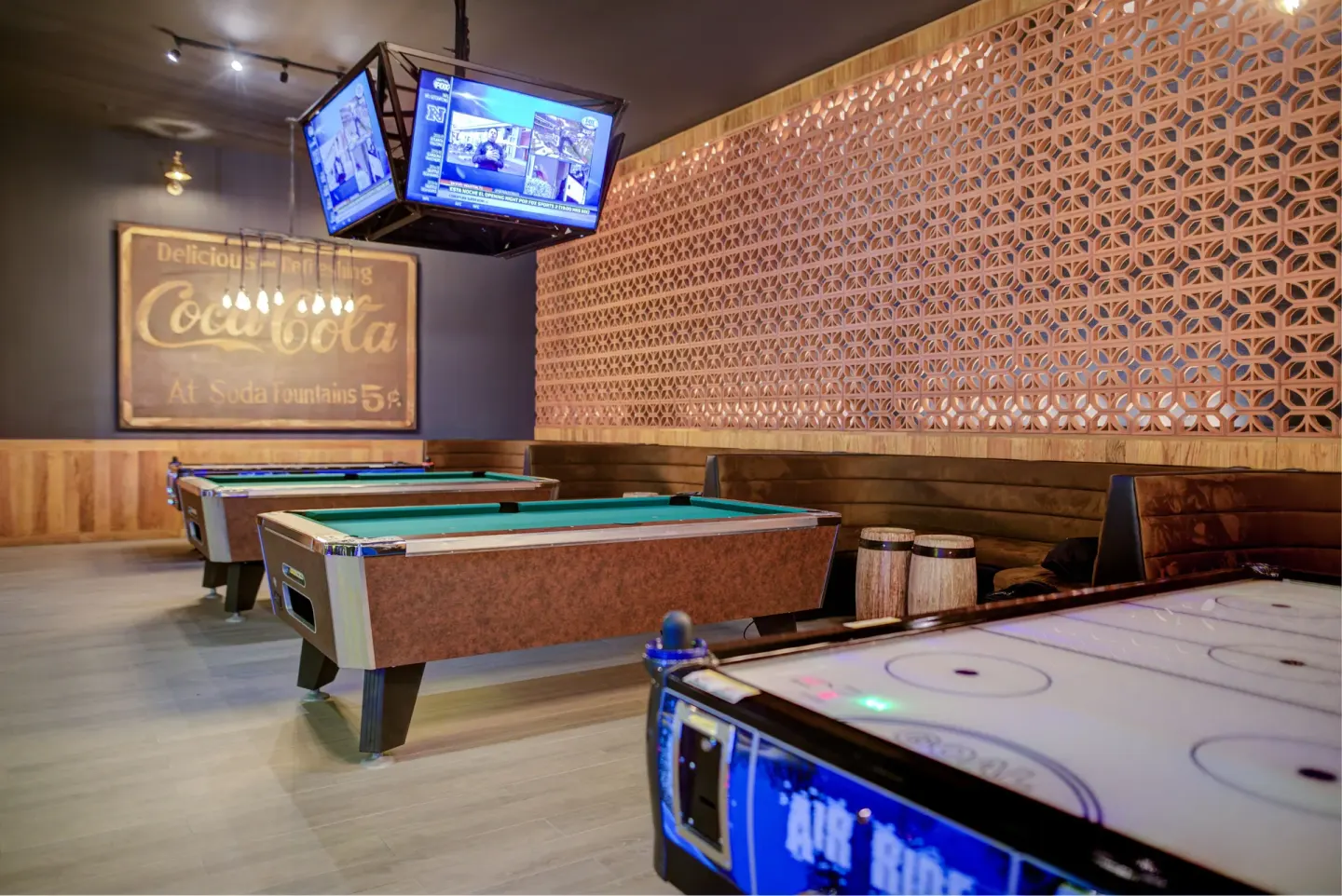 Pool tables and air hockey in the game room at Pueblo Bonito Sunset Beach Golf & Spa Resort.