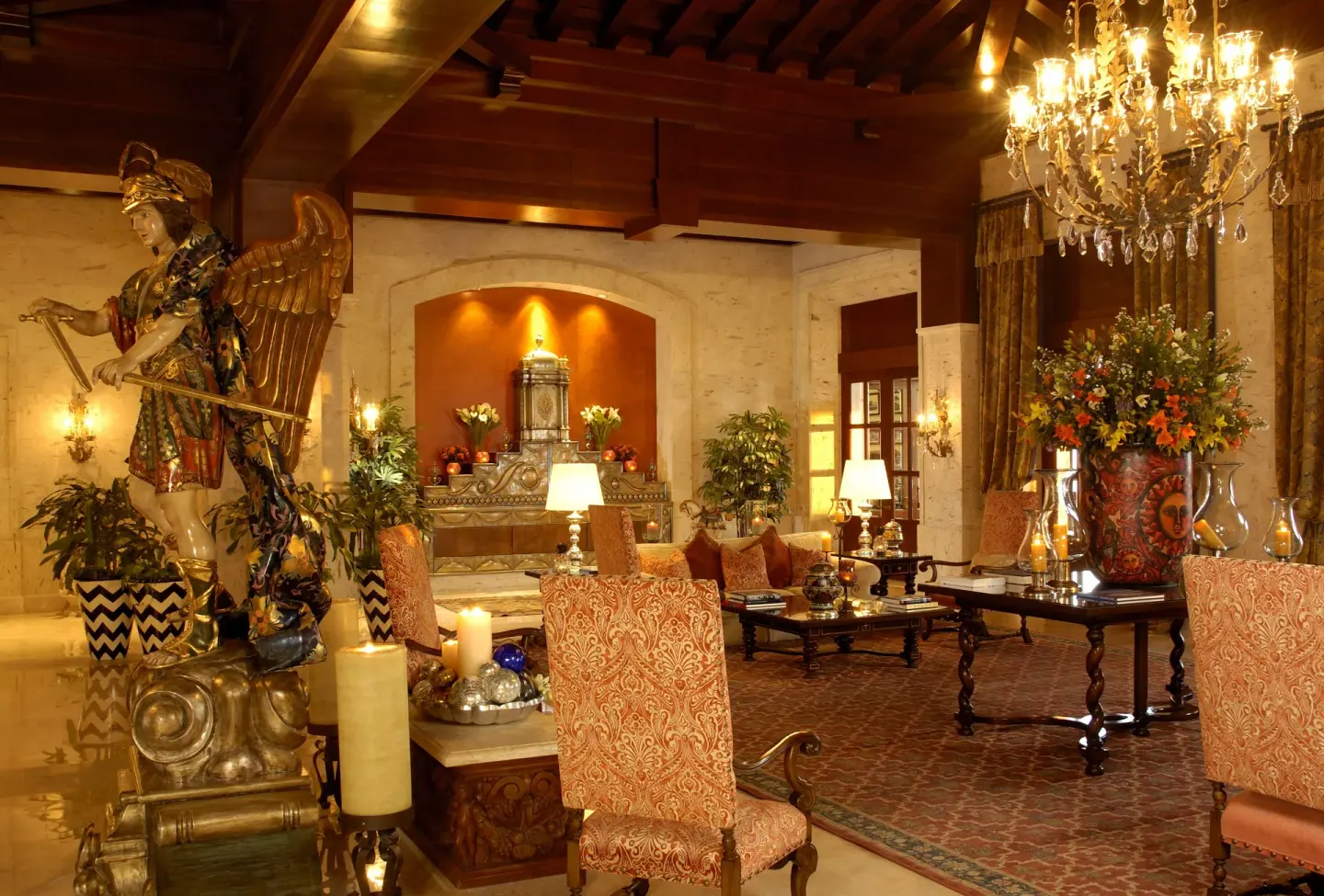 Ornate lobby seating area with chandelier at Pueblo Bonito Sunset Beach Golf & Spa Resort.