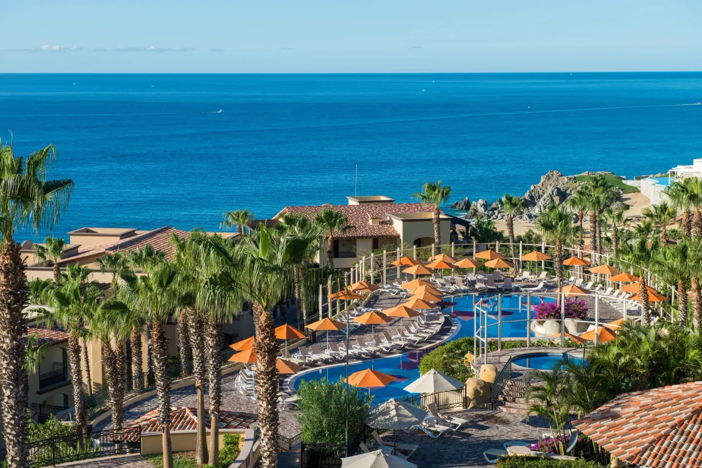 Pool terrace and ocean view at Pueblo Bonito Sunset Beach Golf & Spa Resort.